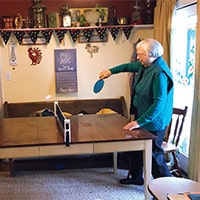 Woman playing ping pong